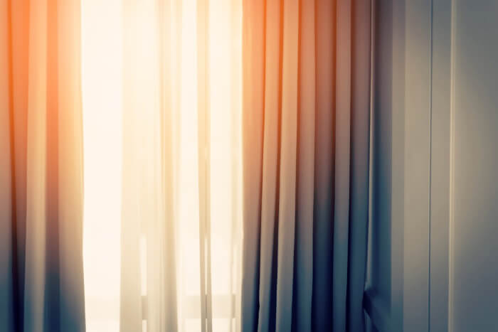 Image of light-filtering curtains that can help your air conditioner work more efficiently