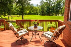 Wood deck with railing.