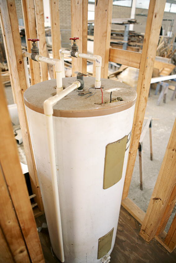 Image of an installed hot water heater in a new build home in framing stage