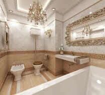 Opulent bathroom with gold accents and a chandelier in the middle