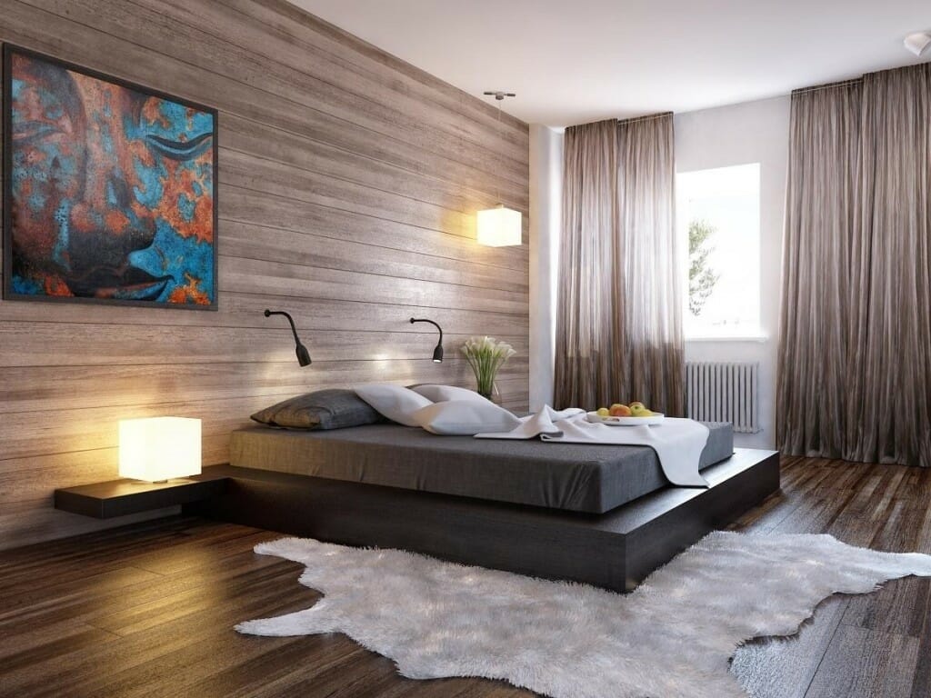 Image of a bedroom with an accent wall, curtains, and dimmed lighting