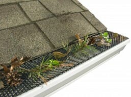 Image of a mesh gutter guard with debris