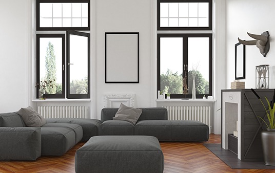 Black casement windows in a modern home living room