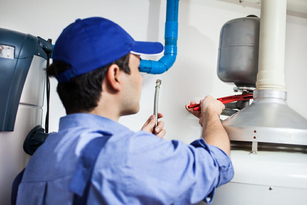 A contractor installs a water heater