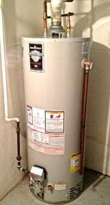 Tank water heater installed in garage