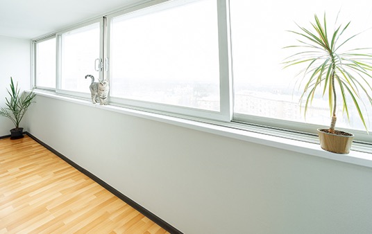 An especially long sliding window in a modern home