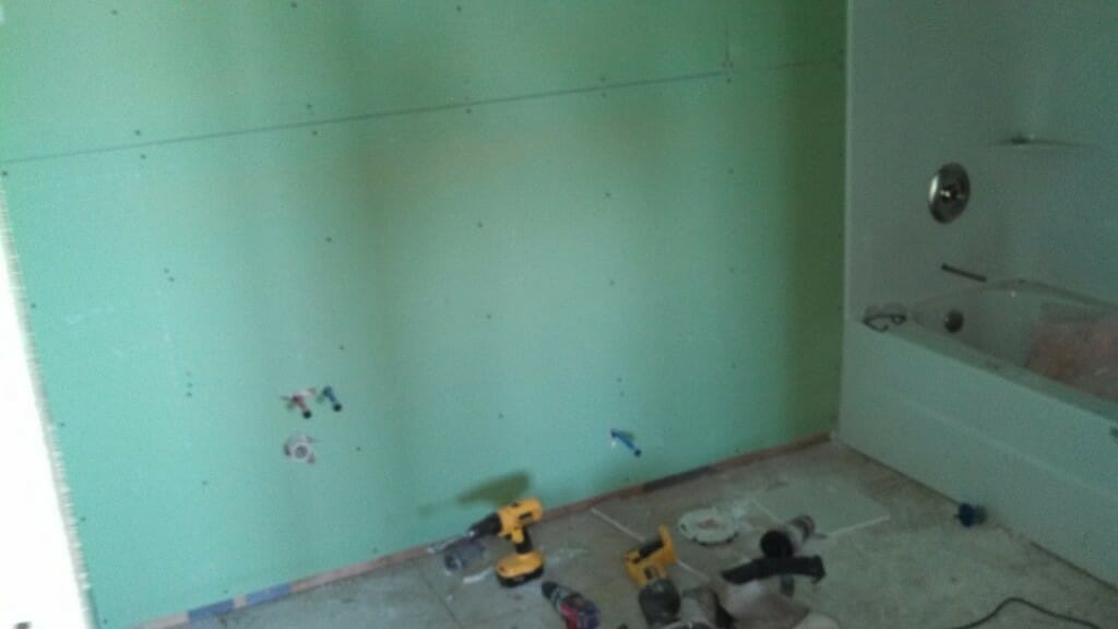 Greenboard installed on wall