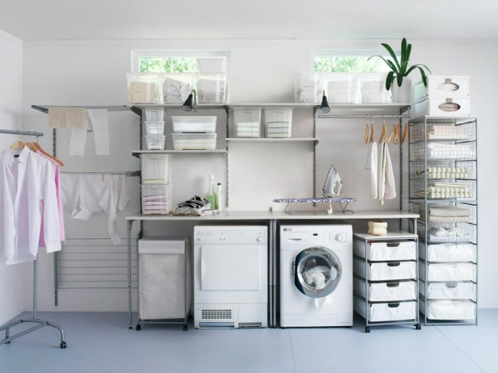 Image of a laundry room with lots of baskets, drawers, and storage