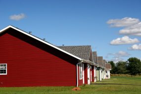 red house with vinyl siding