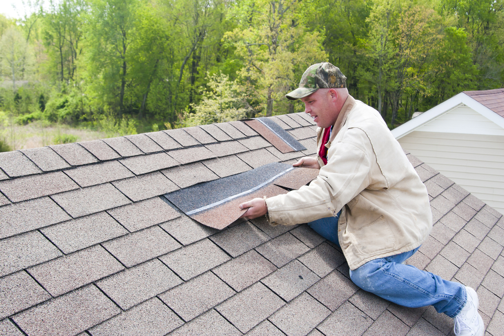 roofer making a repair