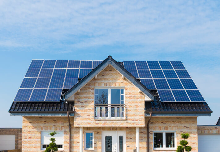 new house with solar panels on its roof