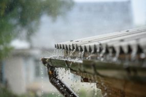 rain flows down from a roof down
