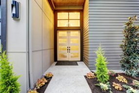 Entry porch of new construction home with contemporary door design in Bellevue, WA.