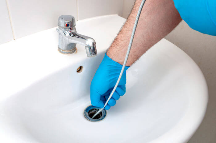 drain snake in bathroom sink clog
