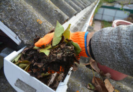 cleaning gutters before storm season