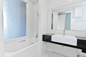 alcove bathtub with shower