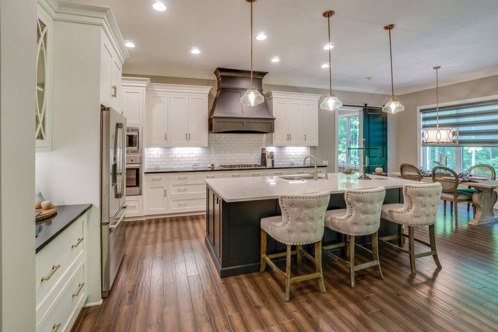 Beautiful engineered hardwood flooring in open kitchen
