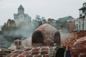 Chimney carrying off smoke from furnace system | Modernize