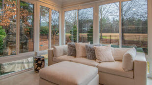 Living room with floor-to-ceiling corner windows