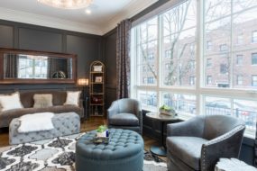 Floor-to-ceiling windows facing the street