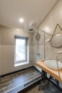 textured glass window in a walk-in shower