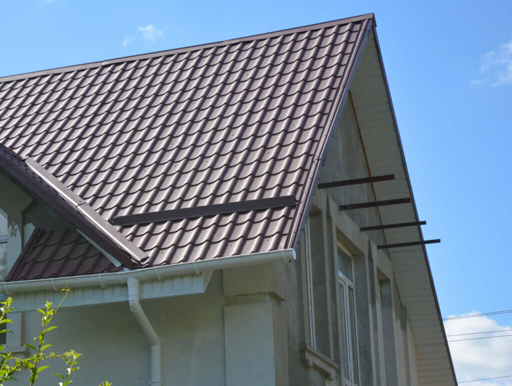 A photo of a home with a clay tile roof
