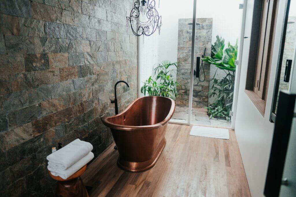 copper bathtub in modern bathroom