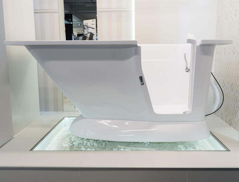 Modern walk-in bathtub from Smooth Baths with a sleek shape and flat bottom