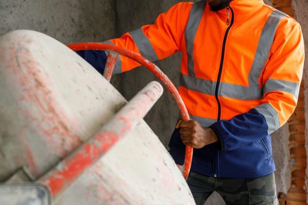 Zoomed-in image of a contractor mixing concrete