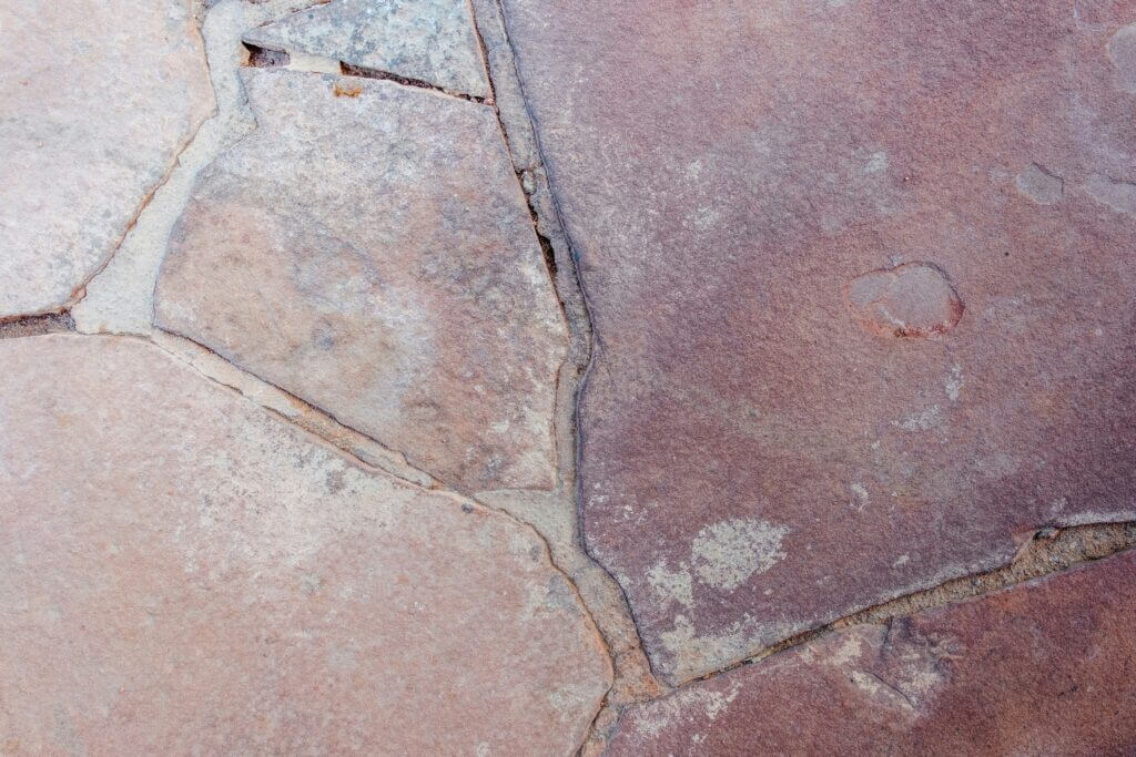 Close-up image of cracked floor tile