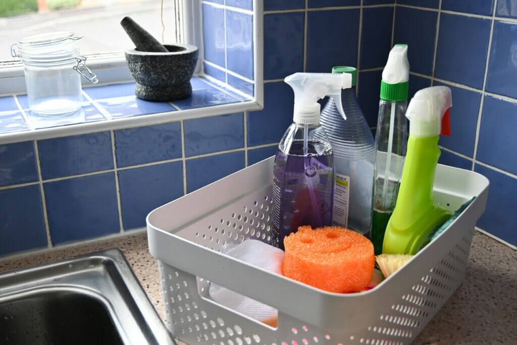 Basket of cleaning supplies