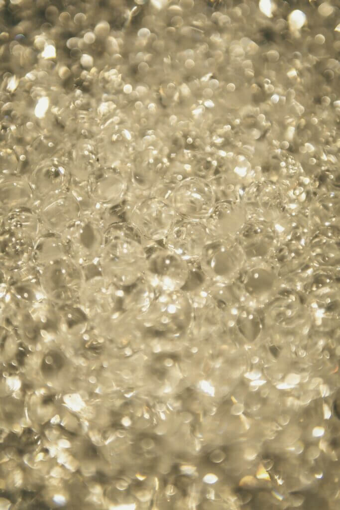 Close-up image of bubbles from boiling water