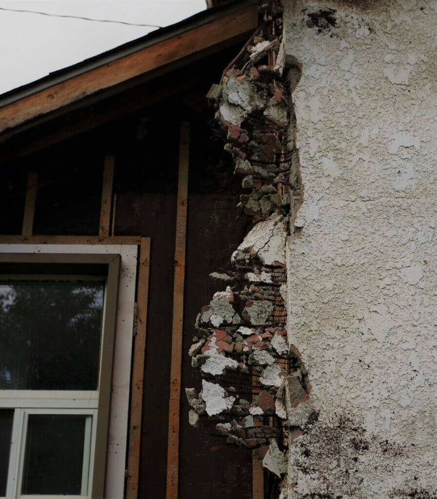 Home exterior removed during a piping replacement