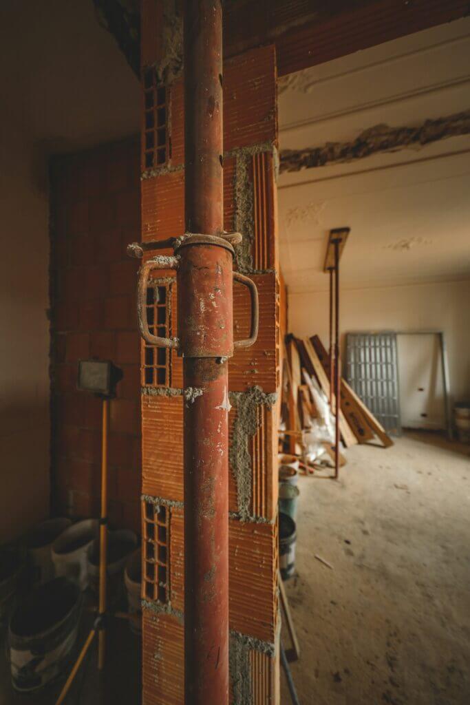 Rusted pipes in a home during a pipe replacement