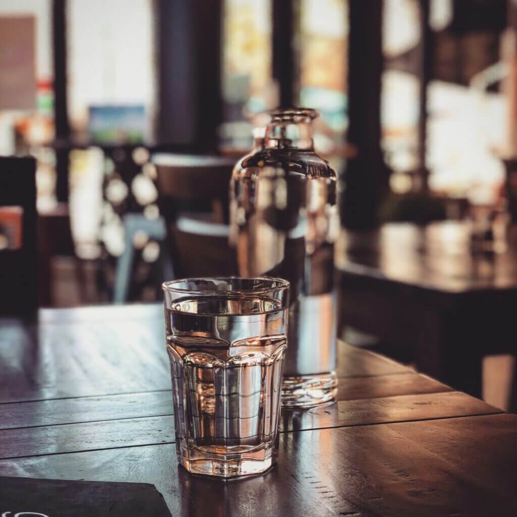 Glass of fresh water on a counter