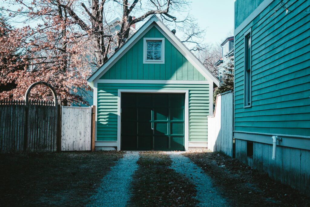 Single tilt garage door on a detached garage