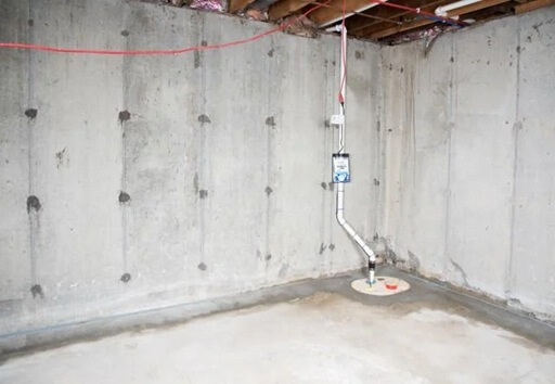 Drainage channel and sump pump installed in basement for waterproofing