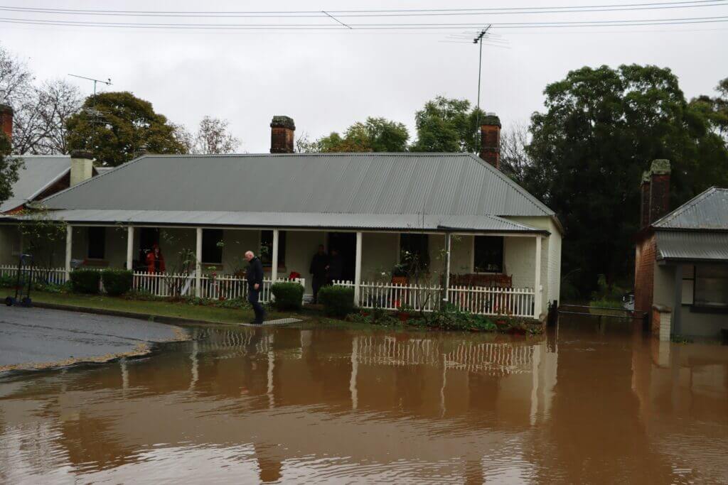 An image of a home in standing water after a flood