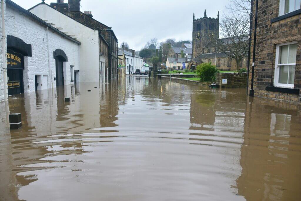 Street with standing water from a flood