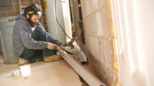Installation of a Groundworks AquaStop BasementGutter