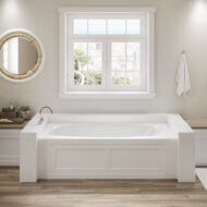 Jacuzzi AMIGA 7236 Skirted Bath installed in a modern, white bathroom