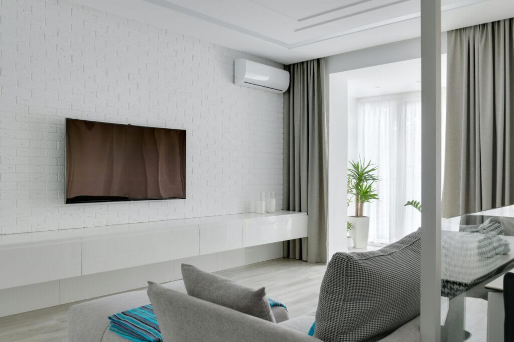 Wall-mounted split AC air handler installed in a home