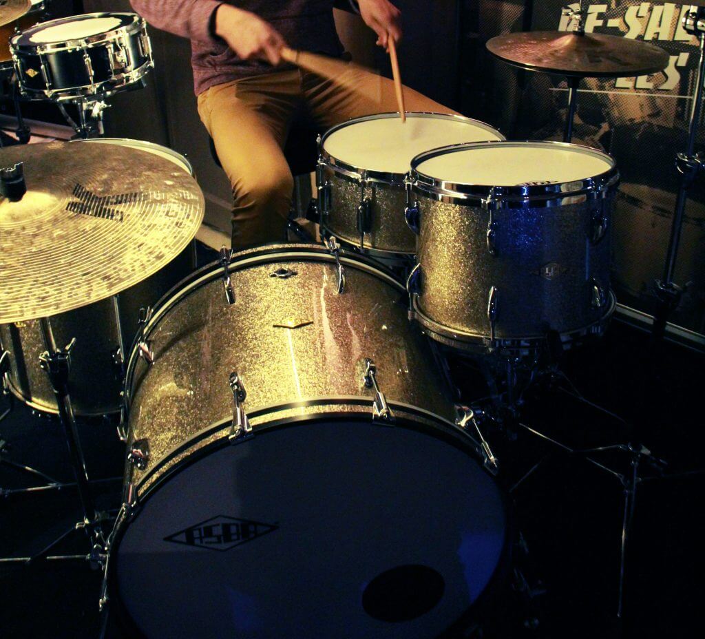 Photo of a person playing the drums