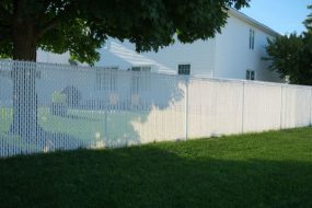 White vinyl fence around yard
