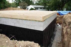 Waterproof membrane applied on a foundation