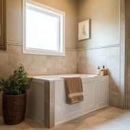 White walk-in tub in a cream bathroom
