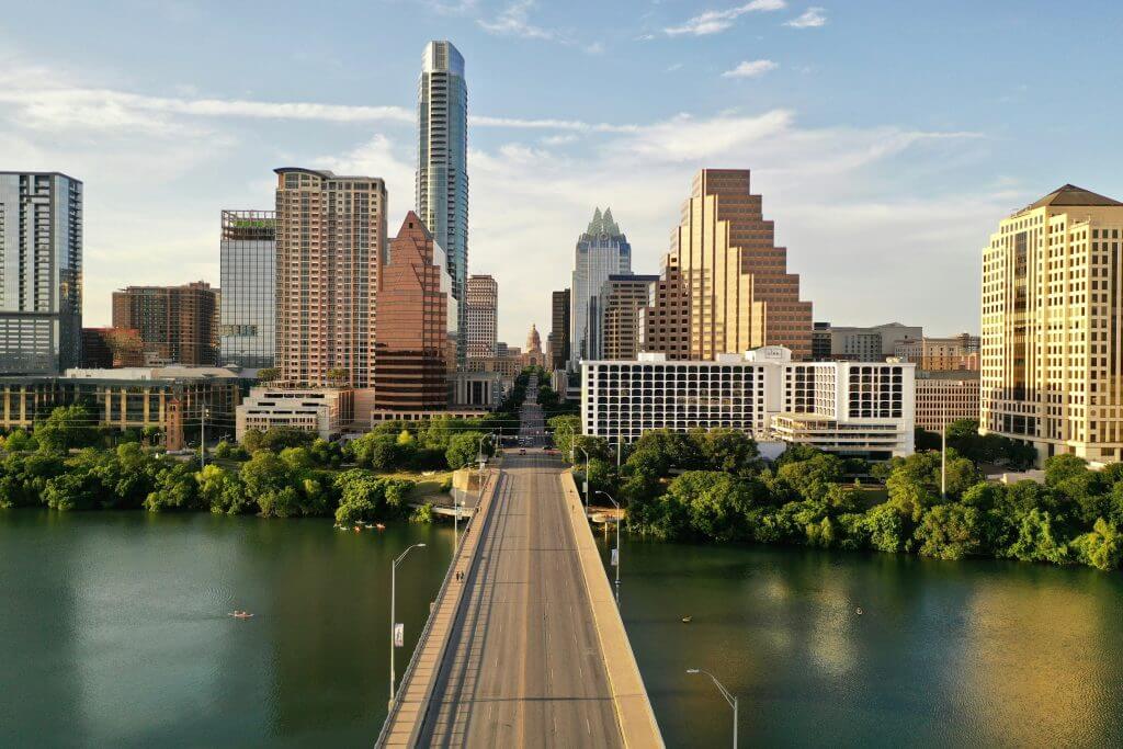 A picture of Austin, TX's skyline as photographed from the Congress Bridge