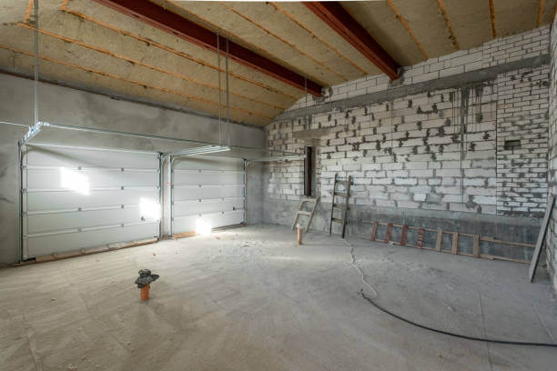 Inside of garage construction, adding insulation to ceiling