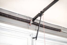 2026 Garage Door Spring Costs by Type, Labor & Door Size