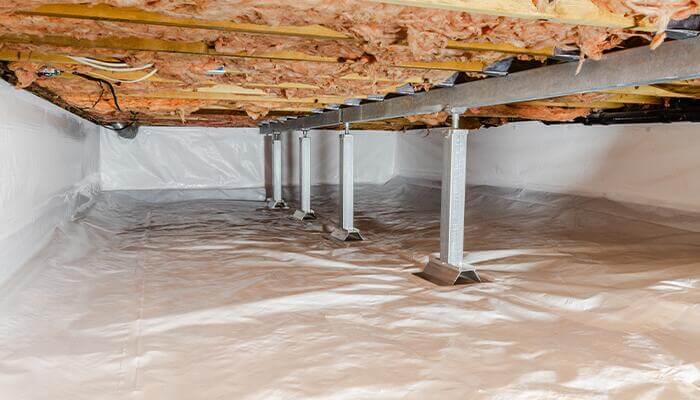 Basement floor stabilized with Basement Systems' SmartJack® Floor Stabilizers